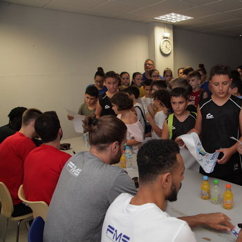 Players signing autographs for their fans during the 3rd Crete International Basketball Tournament